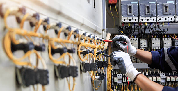 Professional Electrician technician working in Swisher, IA